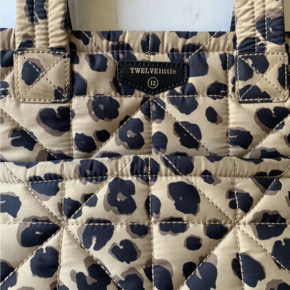 TWELVELITTLE Black and Tan Quilted Baby Bag with Animal Print